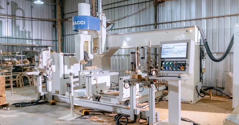 High-tech woodworking machine in an industrial workshop for precision carpentry.